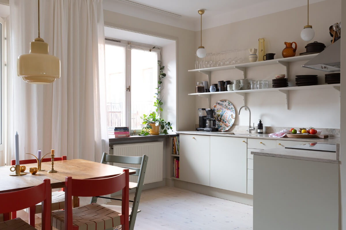 Modern Interiors in a Bright 1930s Apartment in Sweden 4 light scandi kitchen shelves