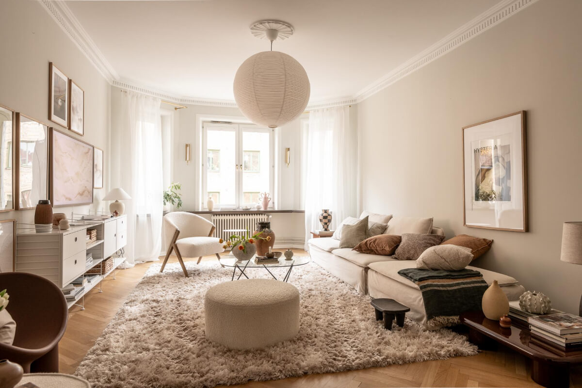 A Beautiful Calm 1920s Apartment in Gothenburg 3 light scandi living room parquet floor
