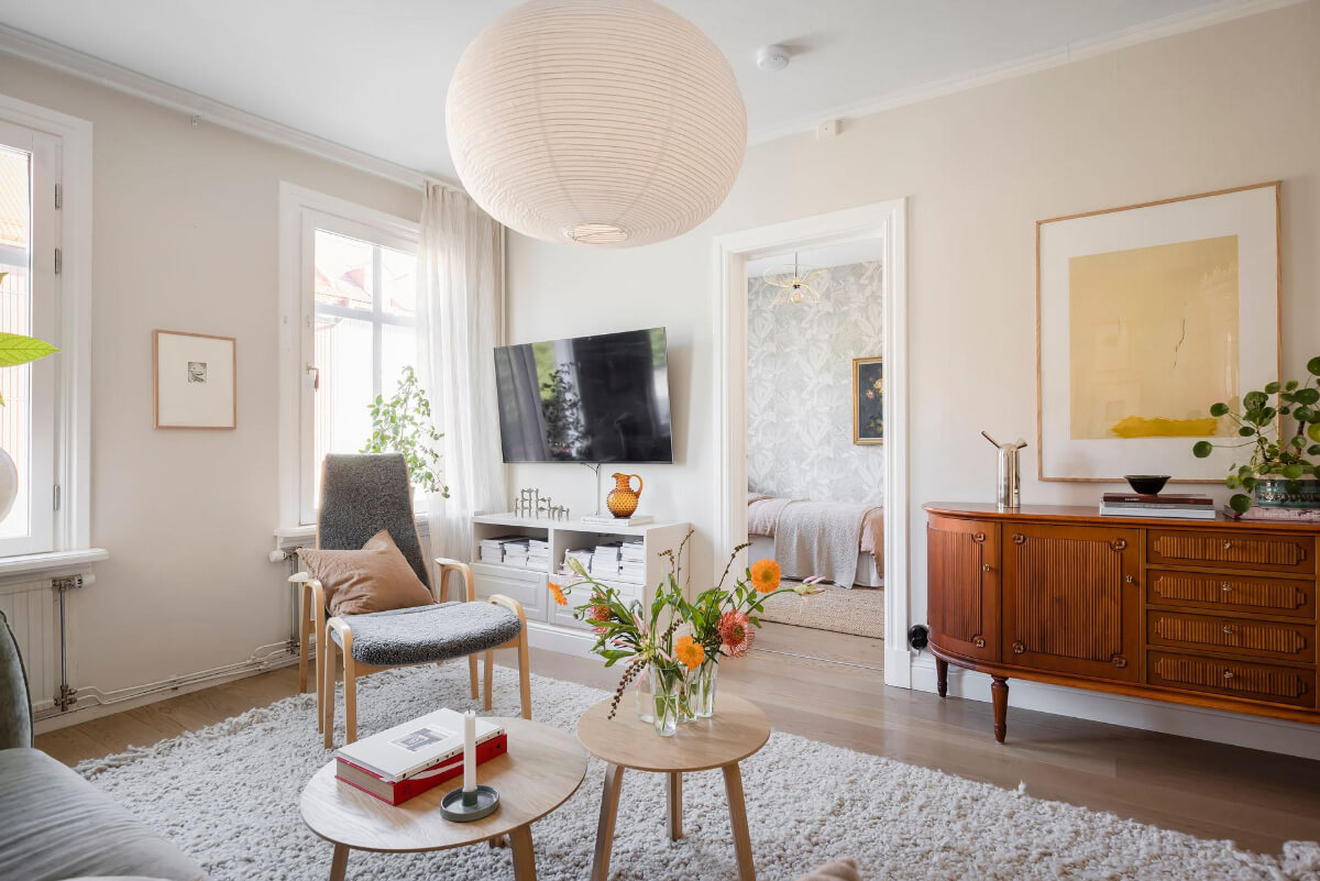 Bright Rooms with Light Color Tones in a Swedish Apartment 5 living room antique console