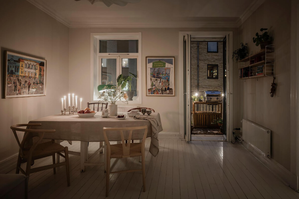 White-Painted Floorboards in a Turn-of-the-Century Apartment 8 living room at night