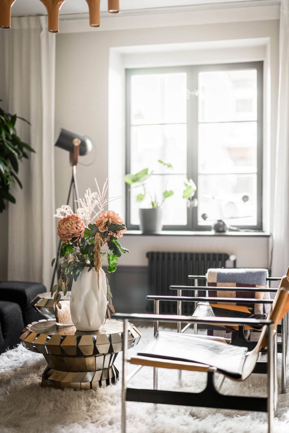 A Swedish Apartment with Exclusive Materials and Monochrome Color Scheme 2 living room detail coffee table