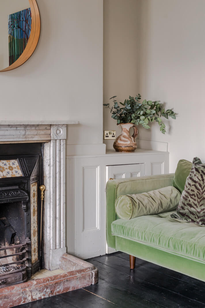 Timeworn Original Floorboards in a Regency Seaside Home 11 living room detail marble fireplace surround