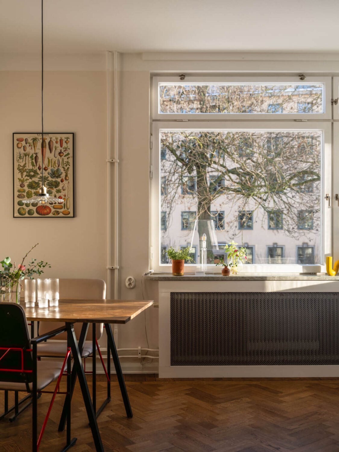A Light, Renovated Two-Bedroom Apartment in Stockholm 5 living room detail parquet floor