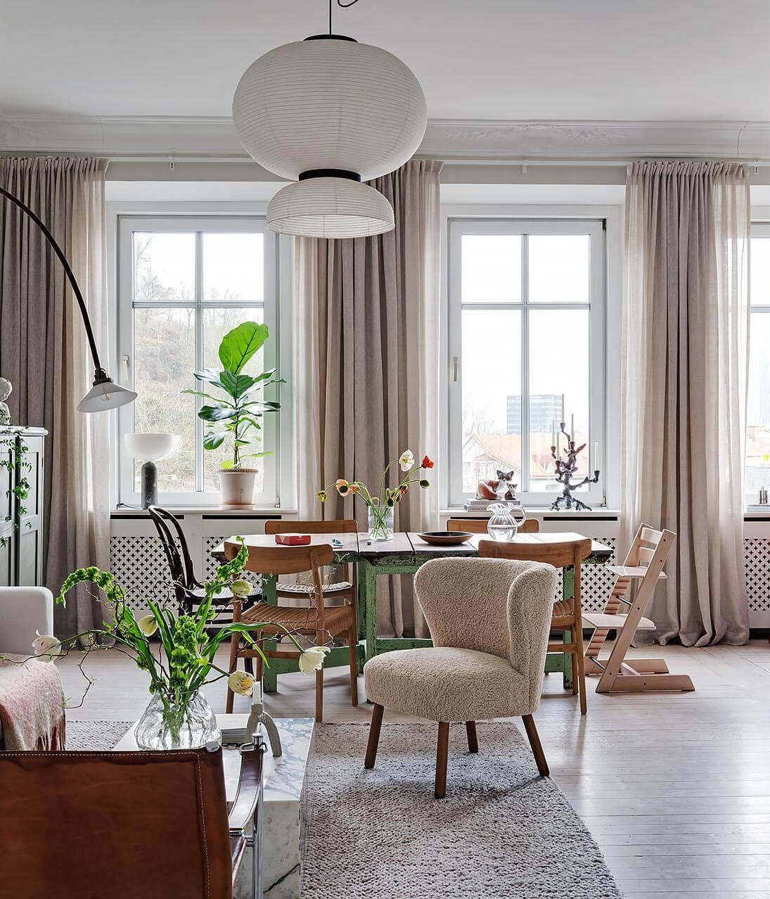 Period Features and Modern Materials in a Swedish Apartment 5 living room dining table