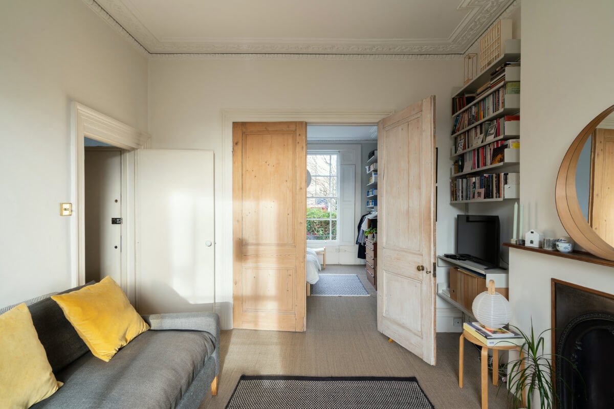 A Light One-Bedroom Apartment in a Victorian Terrace House 5 living room double wooden doors