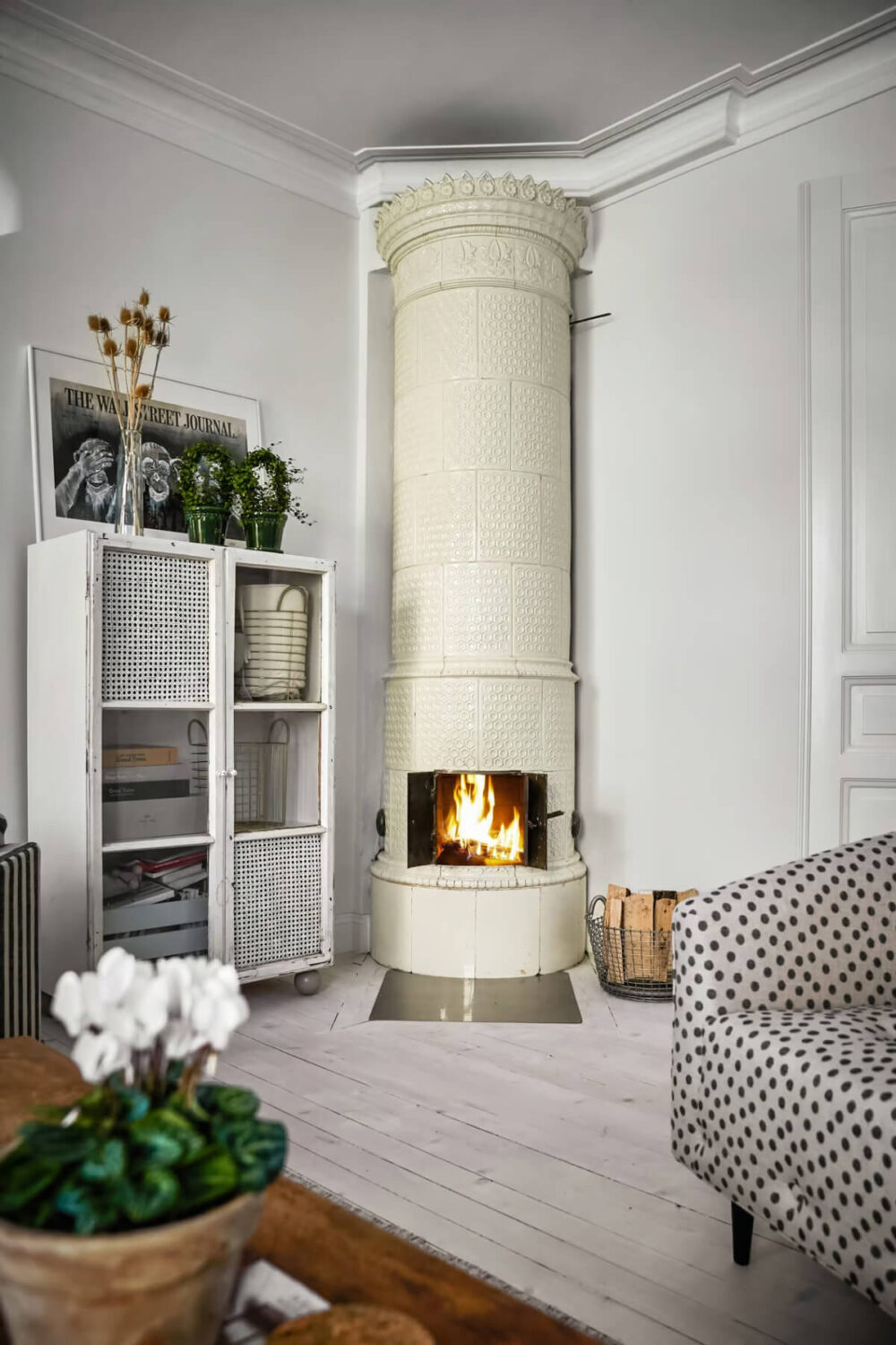 A Bright Turn-of-the-Century Apartment in Sweden 3 living room fireplace