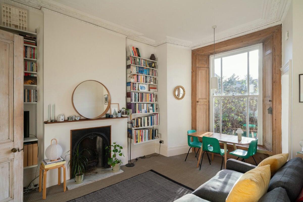 A Light One-Bedroom Apartment in a Victorian Terrace House 2 living room fireplace bay window