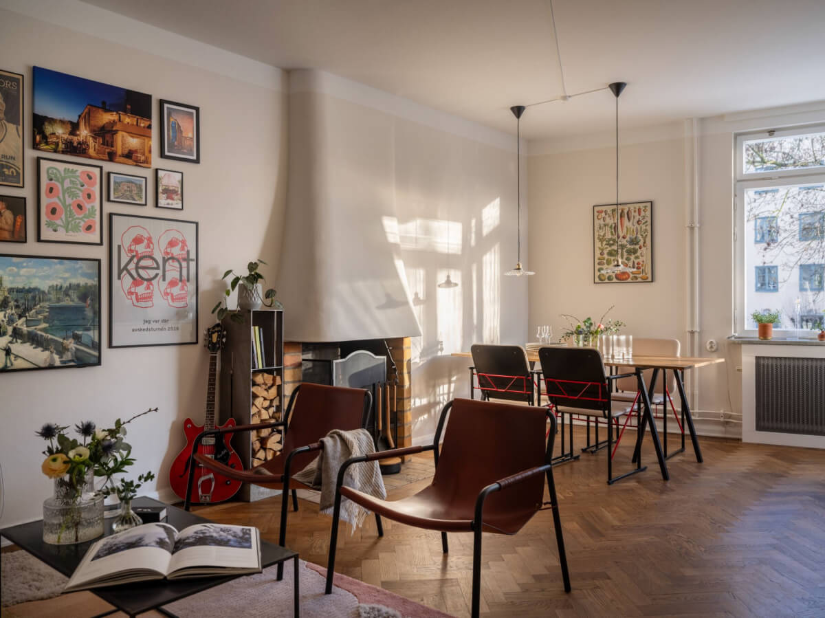 A Light, Renovated Two-Bedroom Apartment in Stockholm 2 living room fireplace herringbone floor