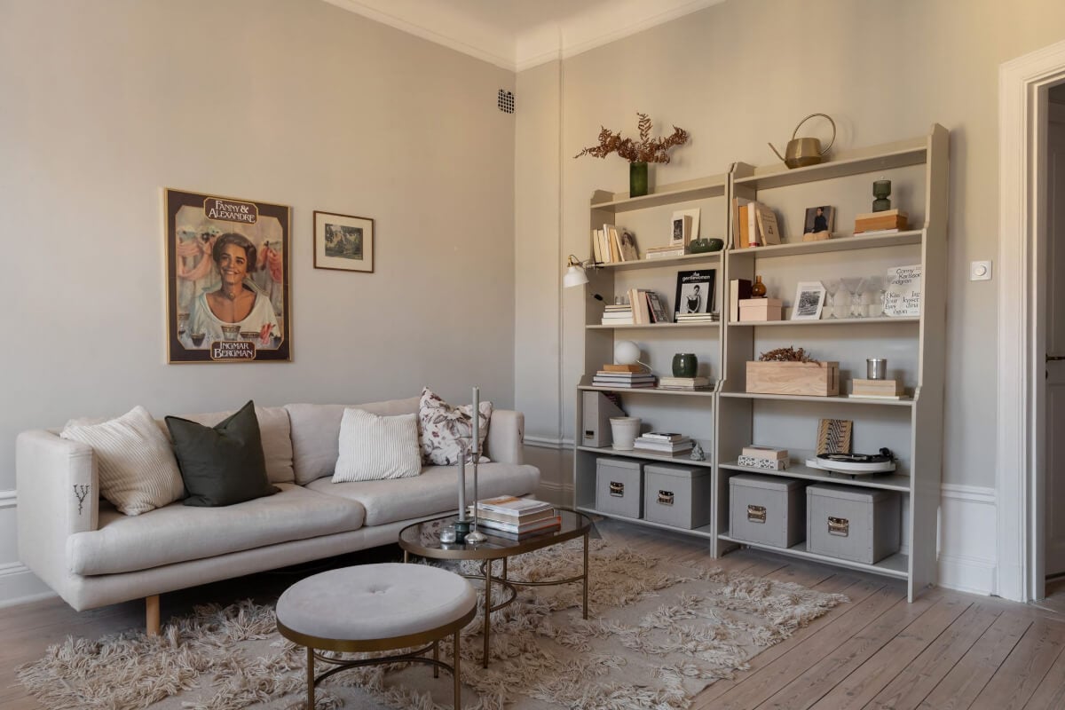 A Small Light Gray Apartment with Period Features 2 living room gray bookcases
