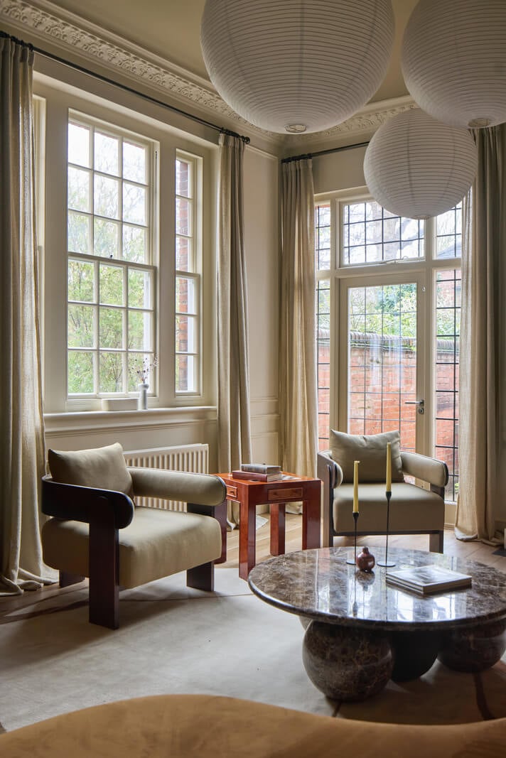 A Stunning Victorian House with Period Features and Surprising Spaces 2 living room high ceilings large windows