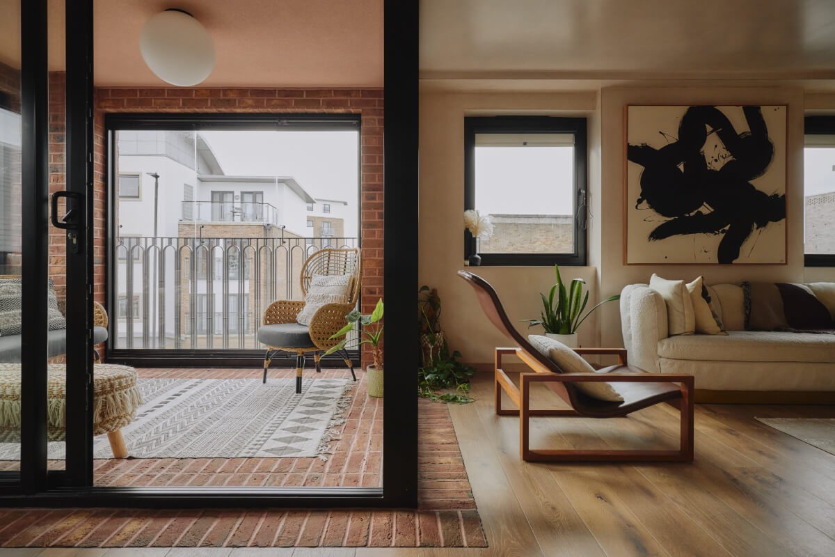 An Elegant Apartment with Plaster Walls and a Winter Garden 11 living room indoor balcony brick floor