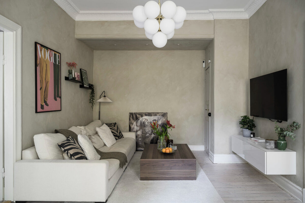 Limewash Wall and Period Features in a Swedish Apartment 3 living room limewash walls wooden floor