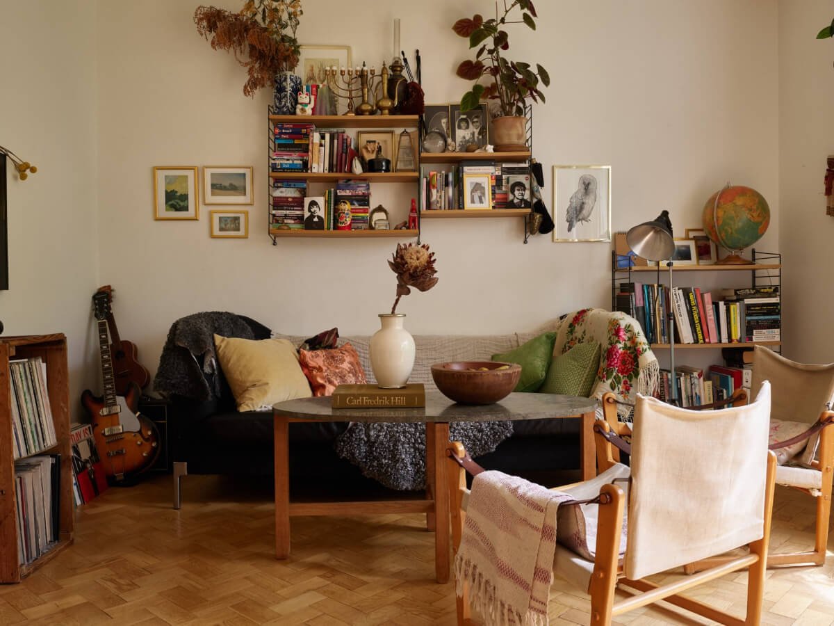 A Small Vintage Apartment with a Tiny Green Patio Garden 2 living room parquet herringbone floor