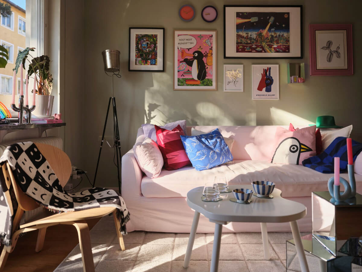 A Midcentury Swedish Apartment with Bright Color Accents 2 living room sage green walls