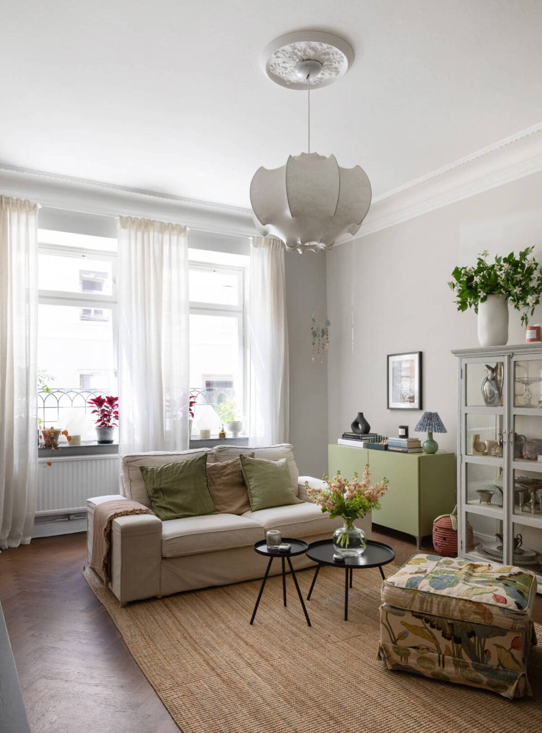 A Charming Ground Floor Apartment with a Large Patio Garden 3 living room small sofa patterned armchair