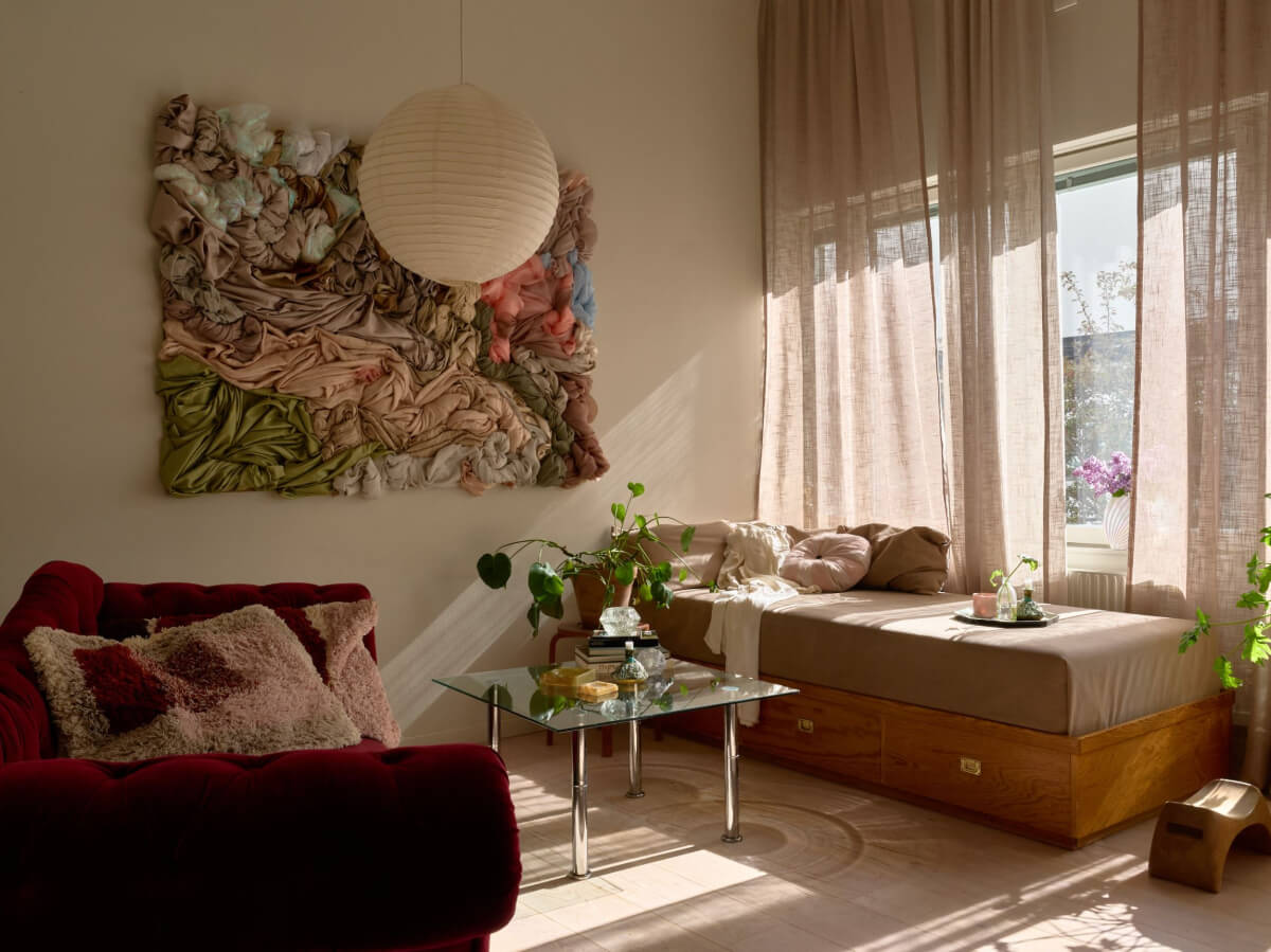 High Ceilings in a Small Swedish Loft Designed for a Family 10 living room window bench with storage
