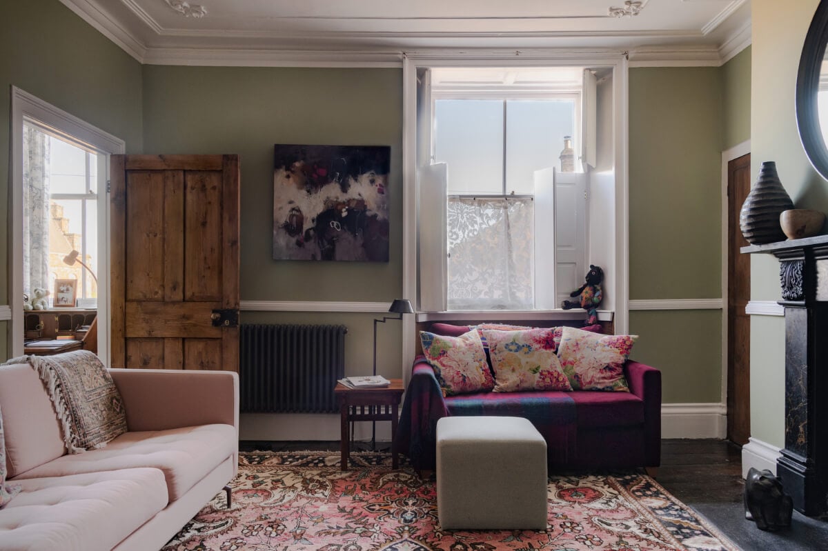 A Georgian English House Restored To Its Former Glory 12 living room with large rug and fireplace