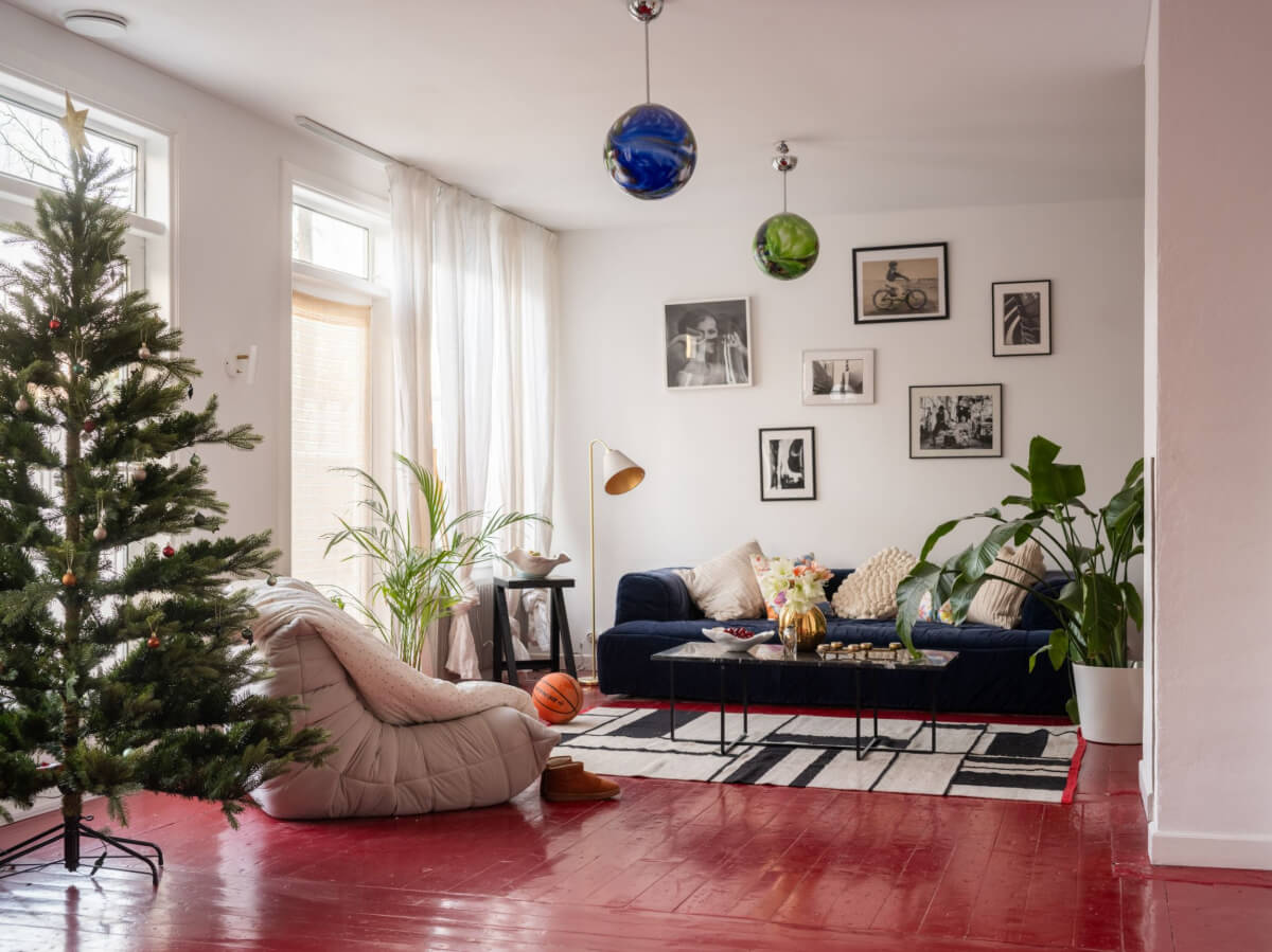 Painted Floorboards in a Unique Family Home in Sweden 3 living room with red painted floorboards