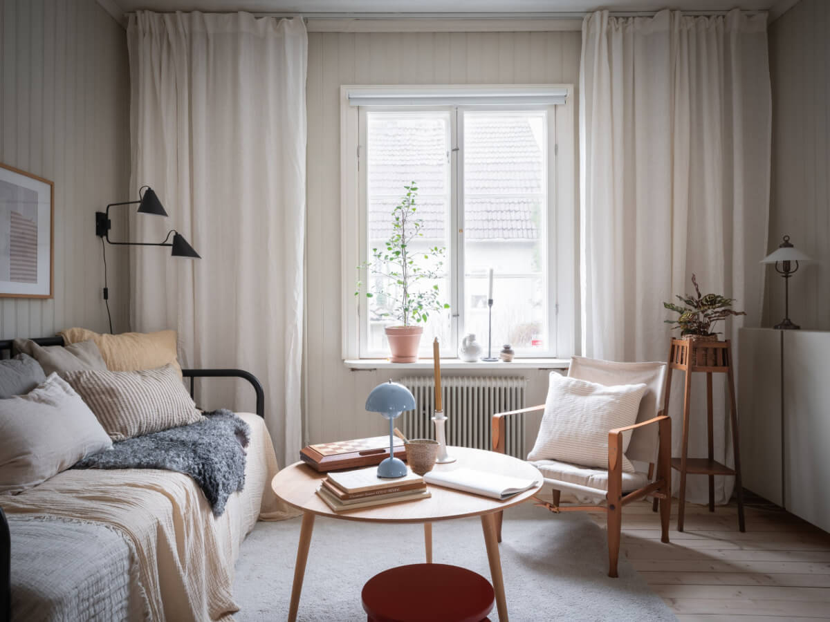 A Carefully Renovated Family Home in Sweden 21 living room with wood paneled walls