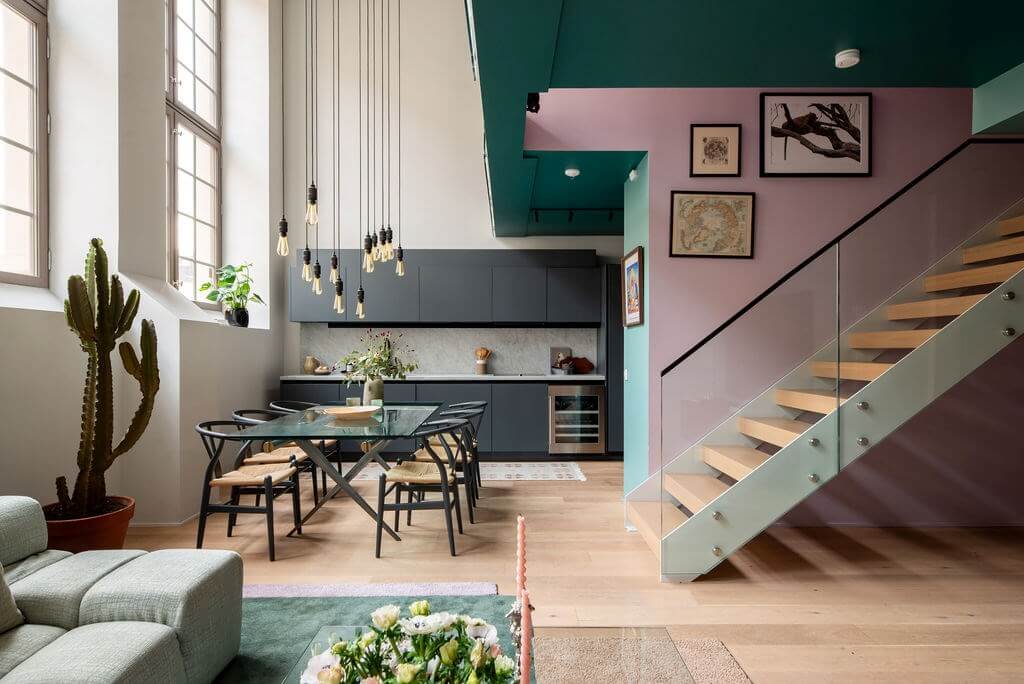 A Loft with High Ceilings and Large Windows in an Exclusive Stockholm Building 4 loft-style living space pink wall