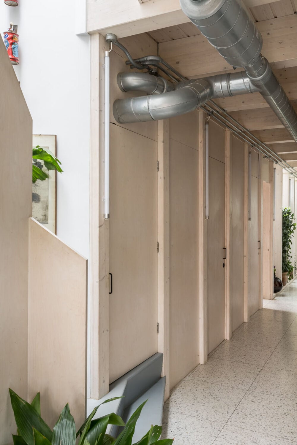 A Unique House in London with Plant-Filled Interiors and a Lush Garden 11 long hall tiled floor