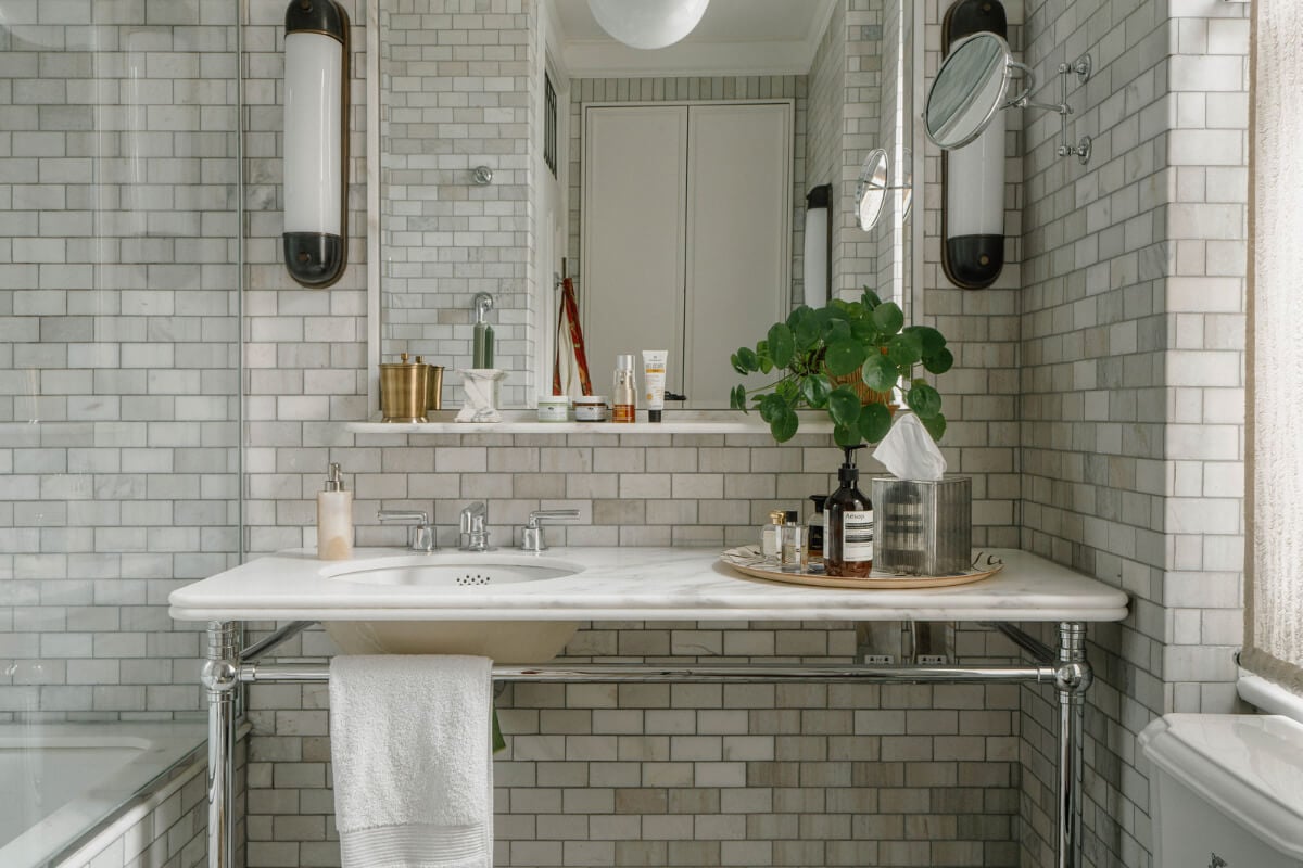 A Cozy Art-Filled Attic Apartment in London 15 marble sink
