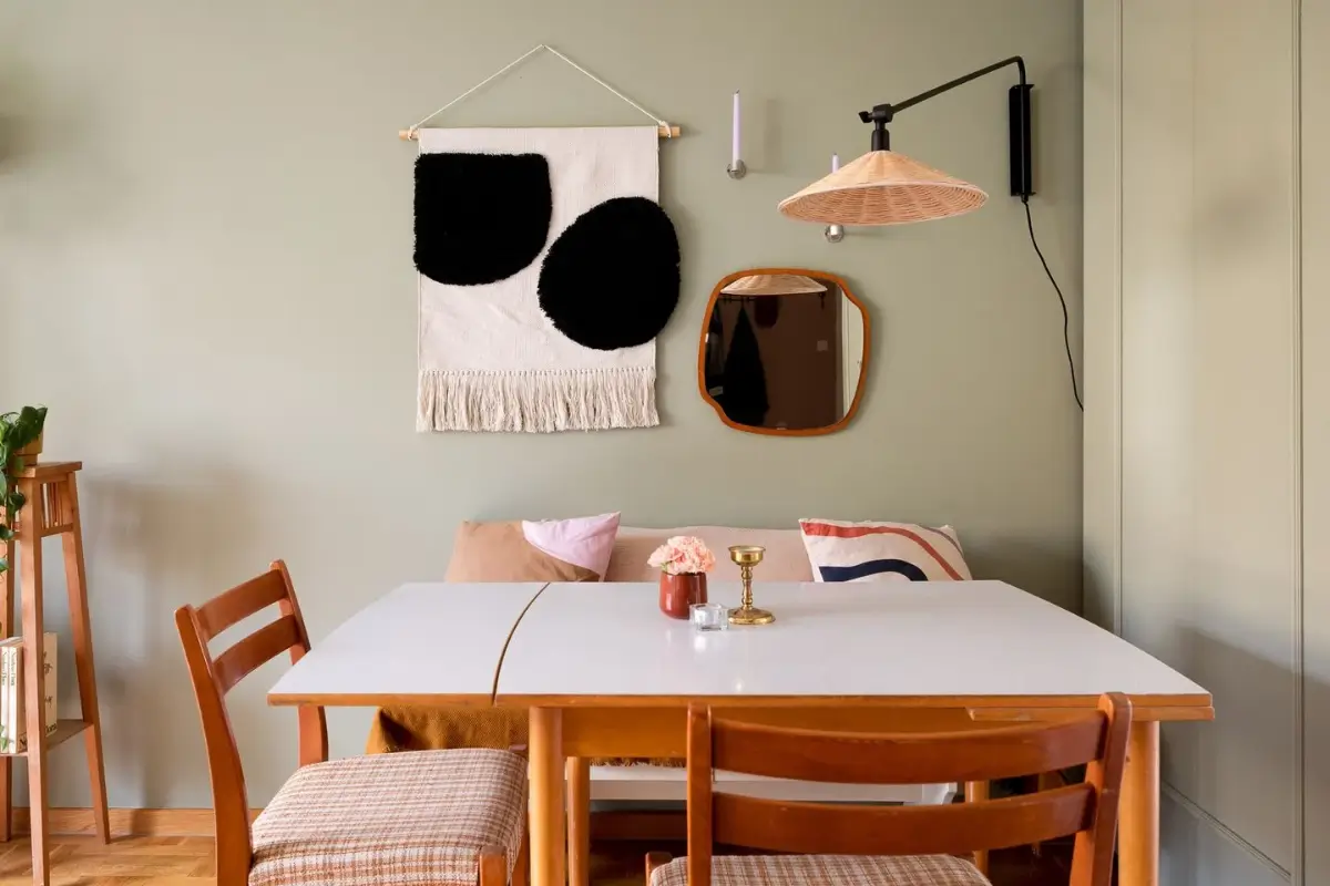 A Swedish Apartment with a Dutch Parquet Floor and Terracotta Bedroom 7 midcentury dining table