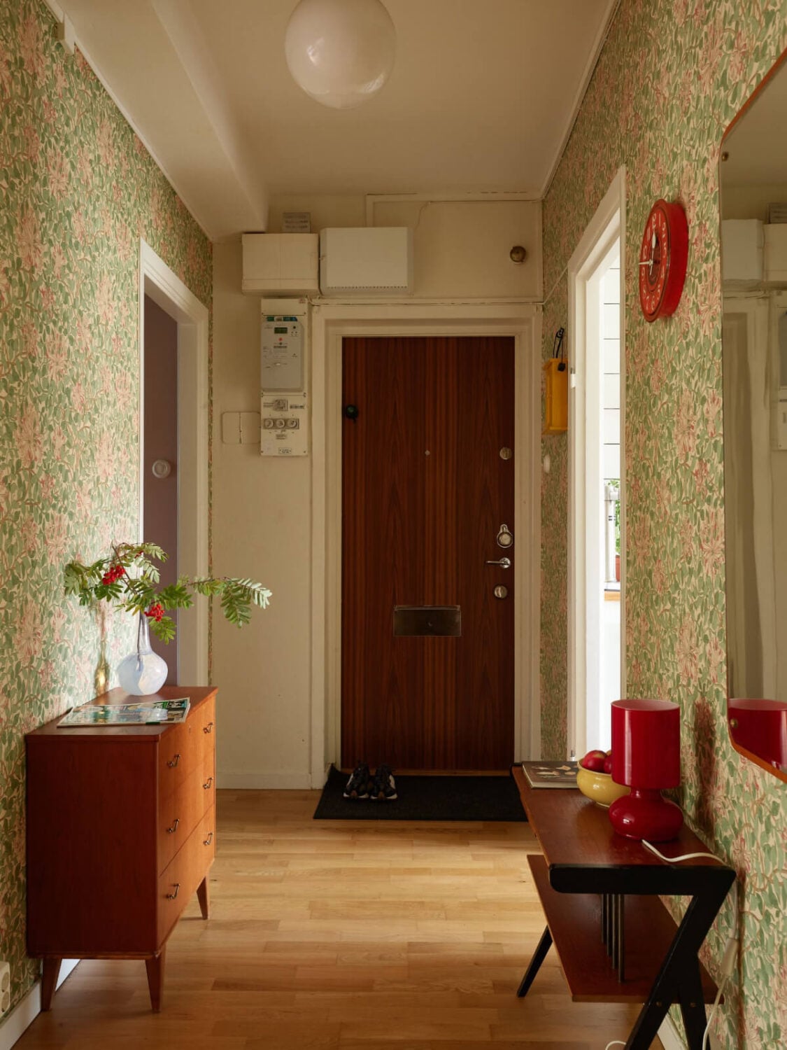 A Charming Midcentury Apartment with Original Features 22 midcentury hall with wallpaper
