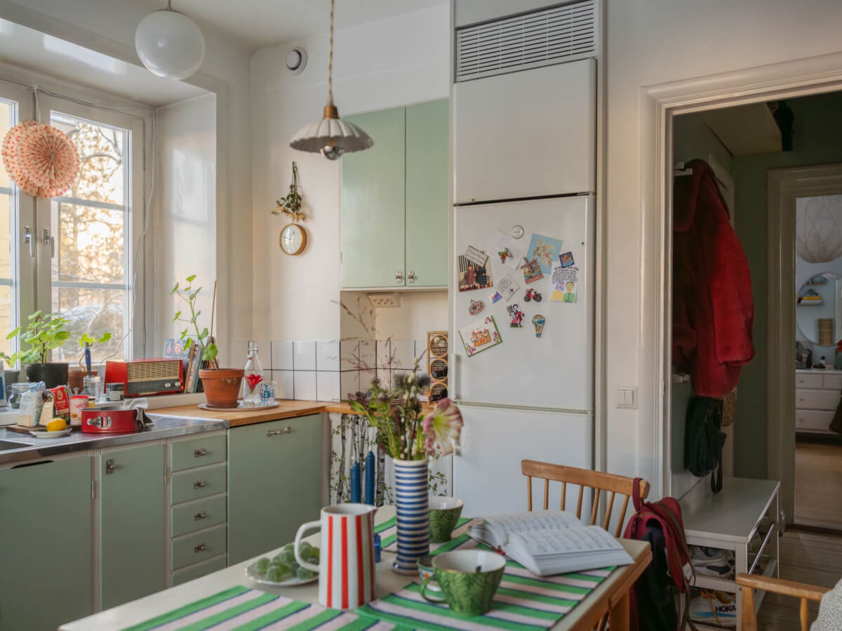 A Charming and Light-Filled Studio Apartment in Stockholm 13 midcentury kitchen
