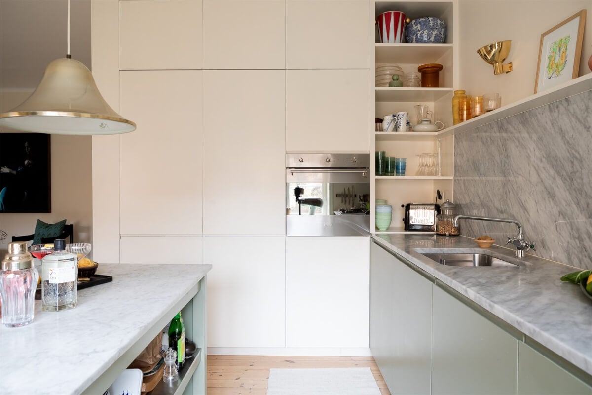 A Light-Filled Two Bedroom Apartment in Stockholm 9 minimalistic high upper cabinets