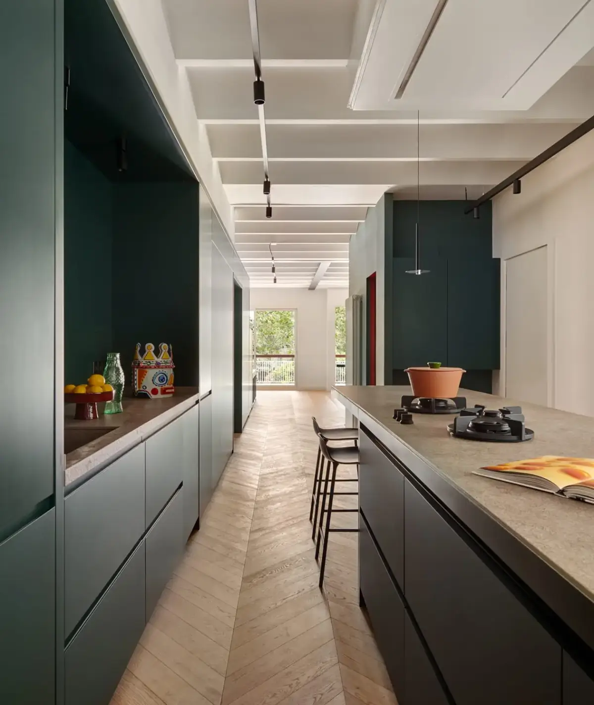 A Modern Barcelona Apartment with a Pink Bathroom 10 modern green kitchen chevron floor