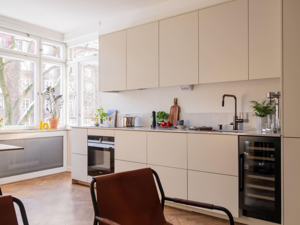 A Light, Renovated Two-Bedroom Apartment in Stockholm 9 modern kitchen black fittings
