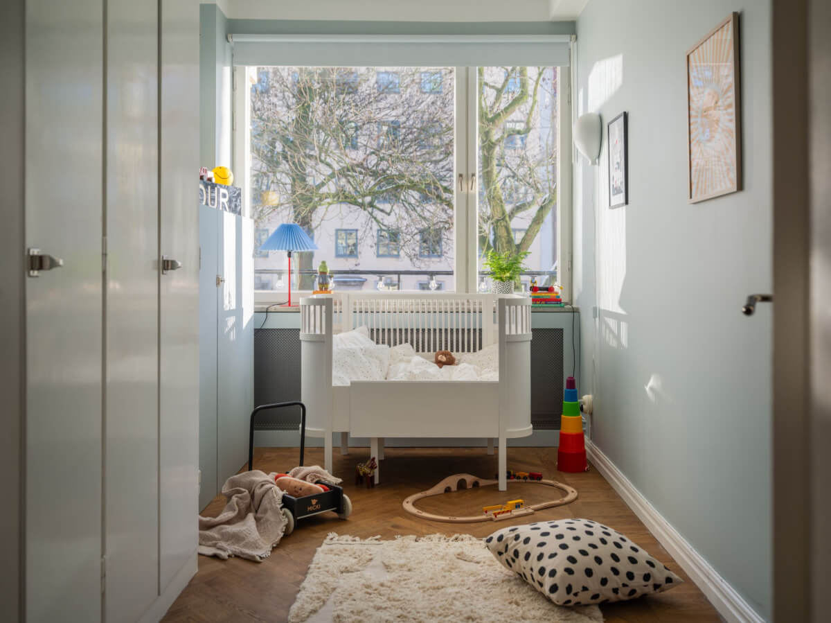 A Light, Renovated Two-Bedroom Apartment in Stockholm 19 nursery with original wardrobes