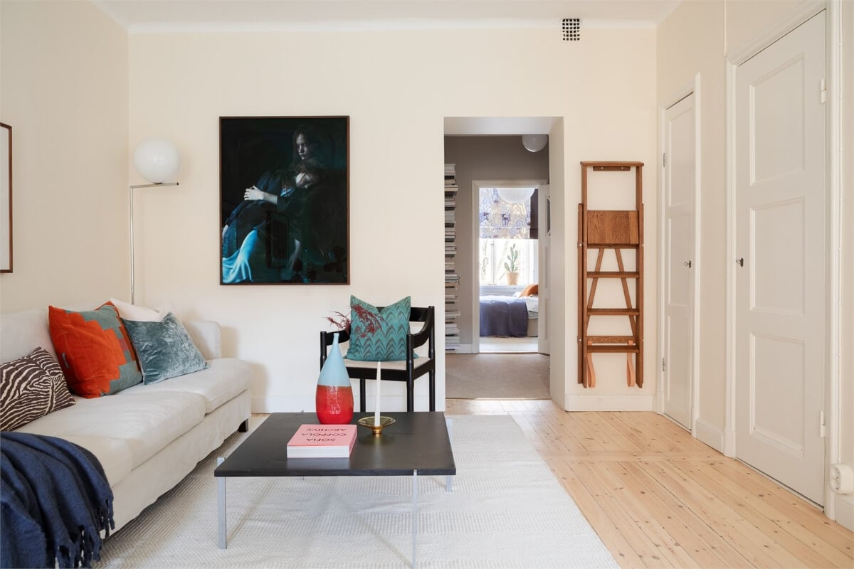 A Light-Filled Two Bedroom Apartment in Stockholm 13 open floor plan light scandi apartment built-in cabinets