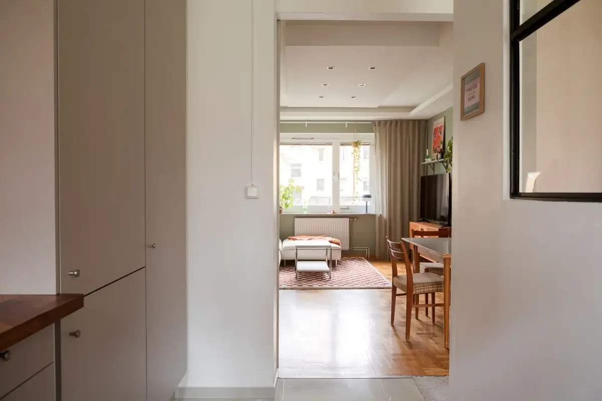 A Swedish Apartment with a Dutch Parquet Floor and Terracotta Bedroom 10 open floor plan living room and kitchen