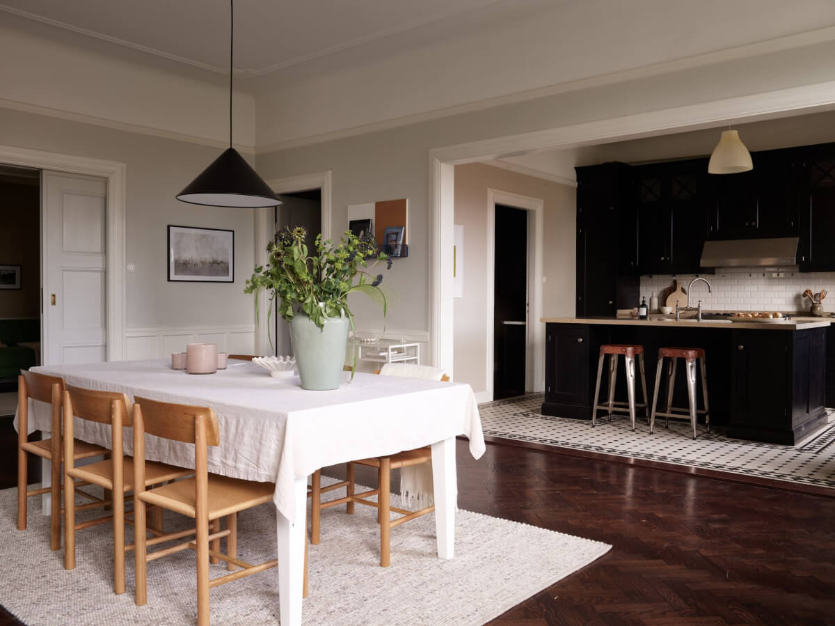 A Grand Early 20th-Century Apartment in Stockholm 4 open kitchen and dining room