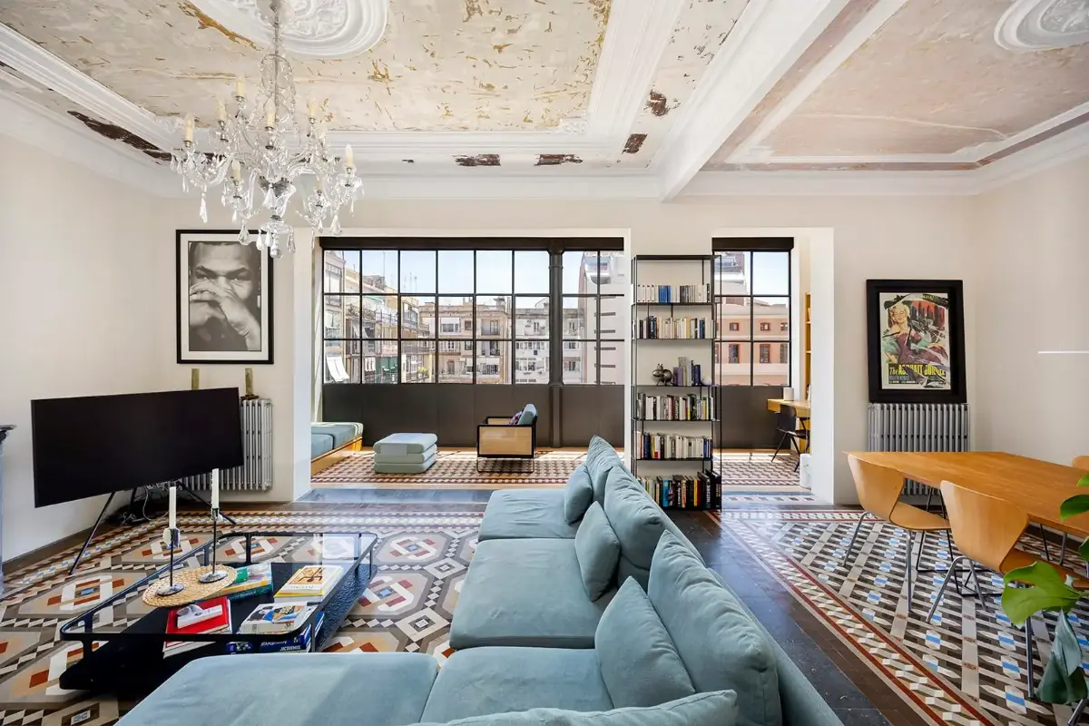 Historic Architecture and Modern Design in a Barcelona Apartment 1 open plan barcelona apartment tile floor exposed ceiling