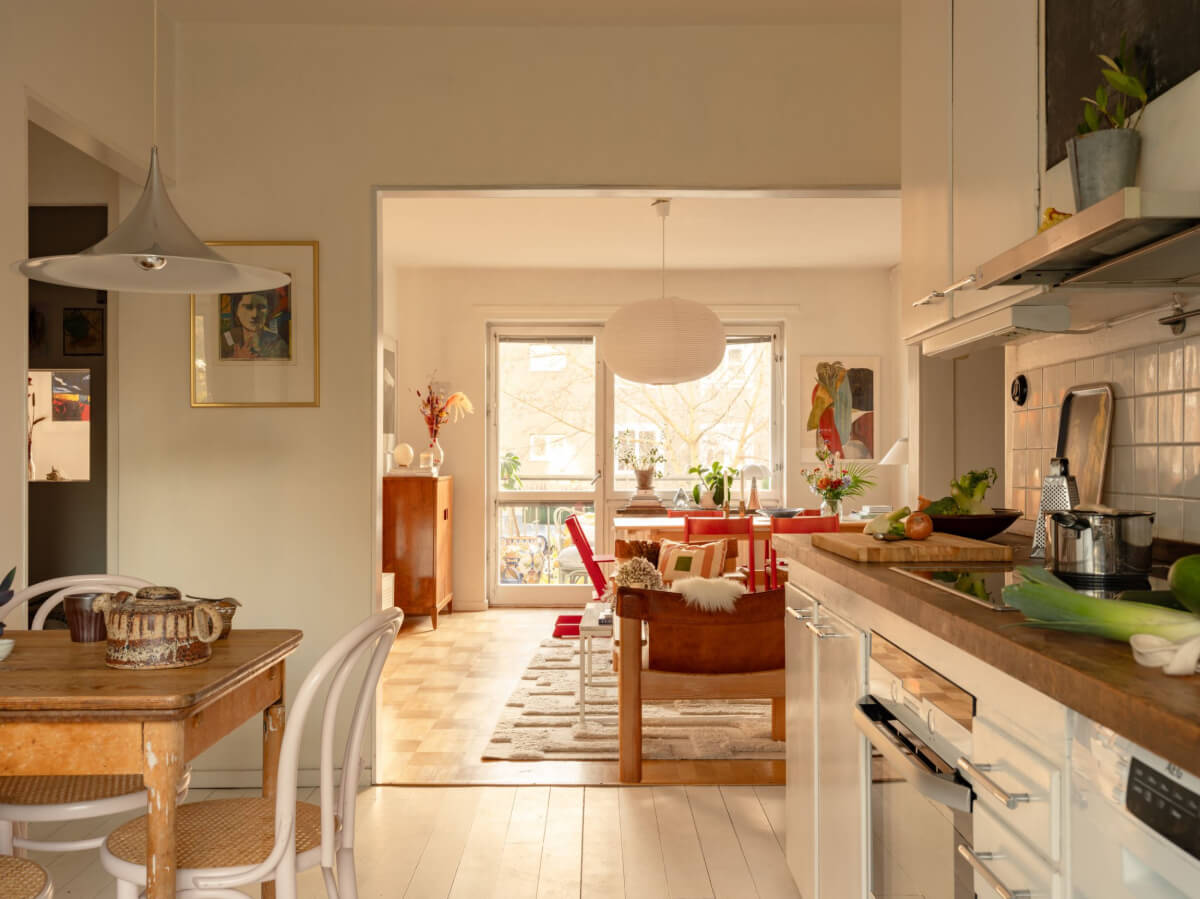 A Charming Midcentury Apartment with a Reading Room 15 open plan kitchen and living room