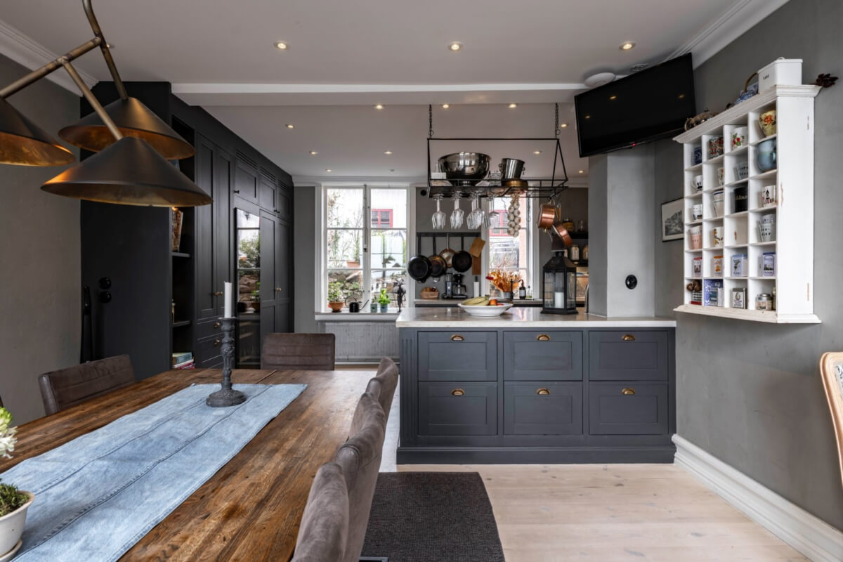 A Renovated 19th-Century Villa on Gotland 8 open plan kitchen wooden dining table