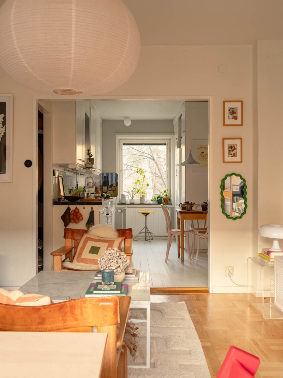 A Charming Midcentury Apartment with a Reading Room 9 open plan living room and kitchen in midcentury apartment
