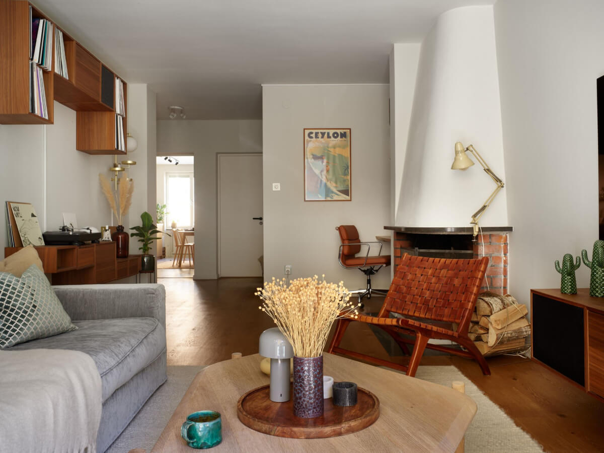 A Stockholm Apartment with a Beautifully Renovated Kitchen 5 open plan living room fireplace