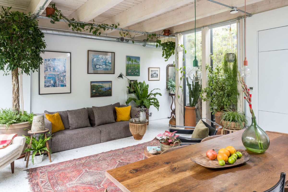 A Unique House in London with Plant-Filled Interiors and a Lush Garden 4 open plan living space vintage rug