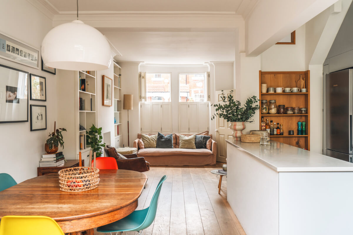 A Charming Light Edwardian House with a Tiny Garden 1 open plan living space wooden floor window shutters