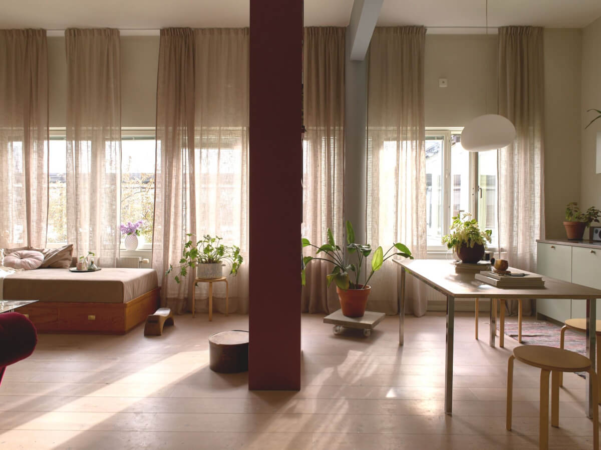 High Ceilings in a Small Swedish Loft Designed for a Family 1 open plan scandinavian living space