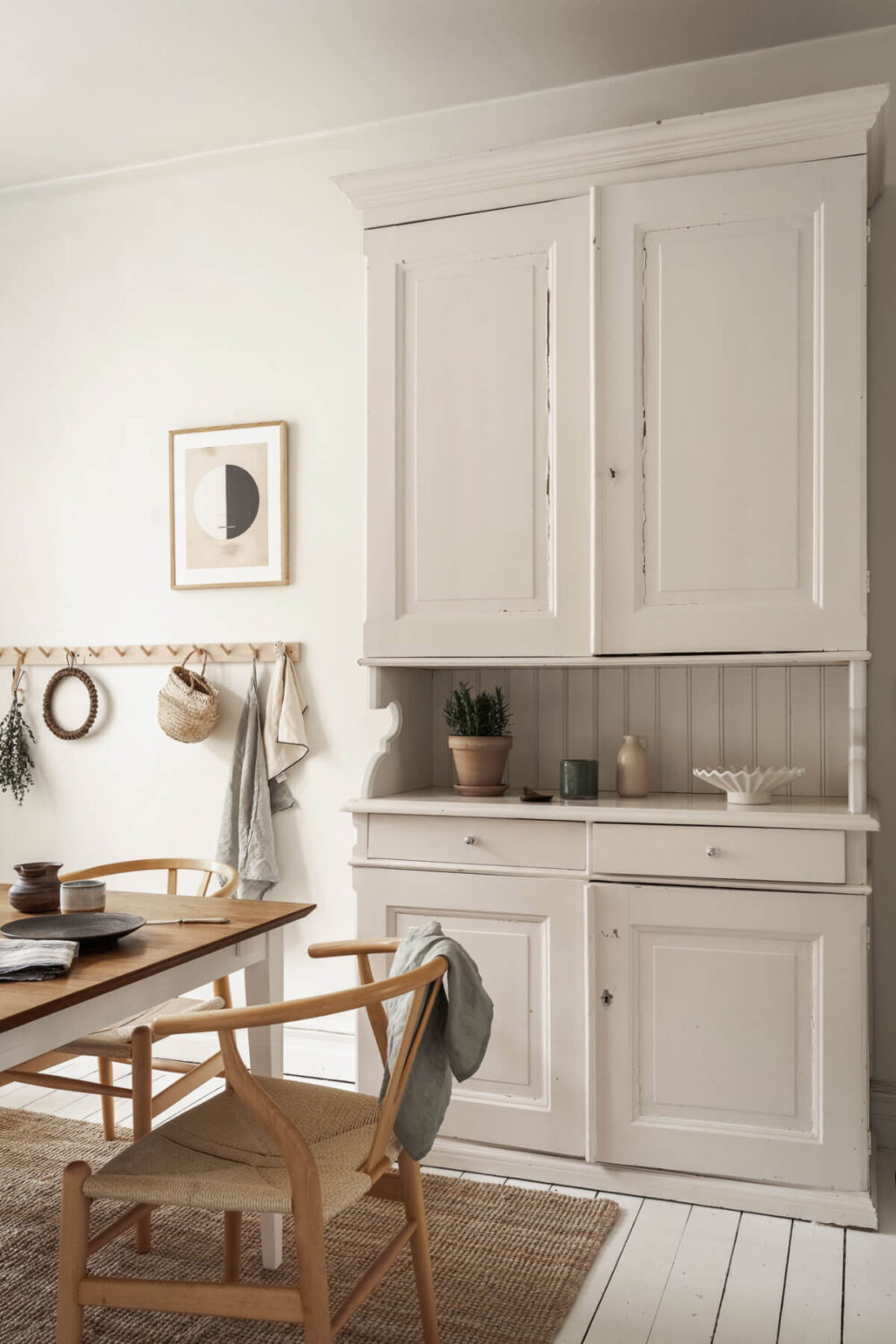 A Stylish Studio Apartment with Period Features and Large Windows 15 period cabinet kitchen