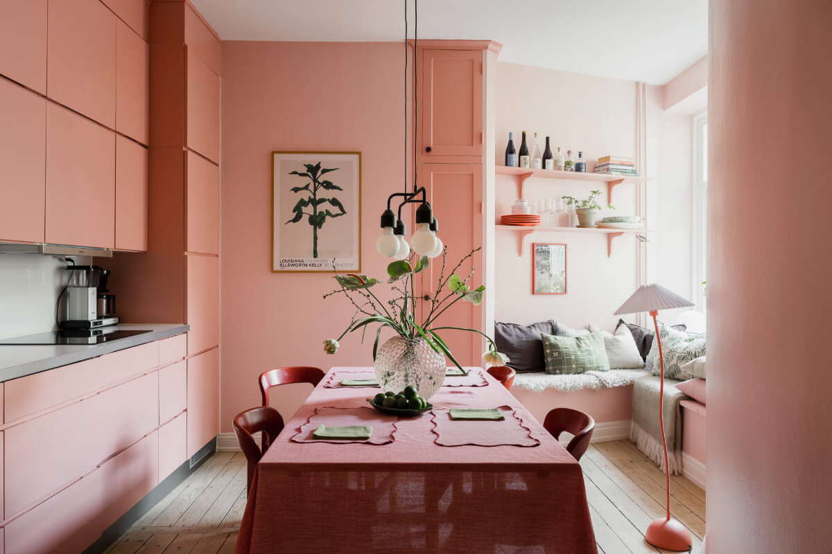 Trend Alert: The 'Soft Kitchen' is 2026's Coziest Interior Trend and It's Here to Stay 23 pink kitchen with dining table and window seat