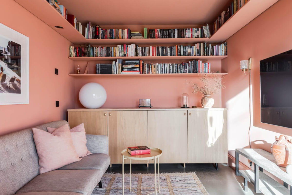 A Swedish Architectural Villa Surrounded by Nature 10 pink television room with high shelves