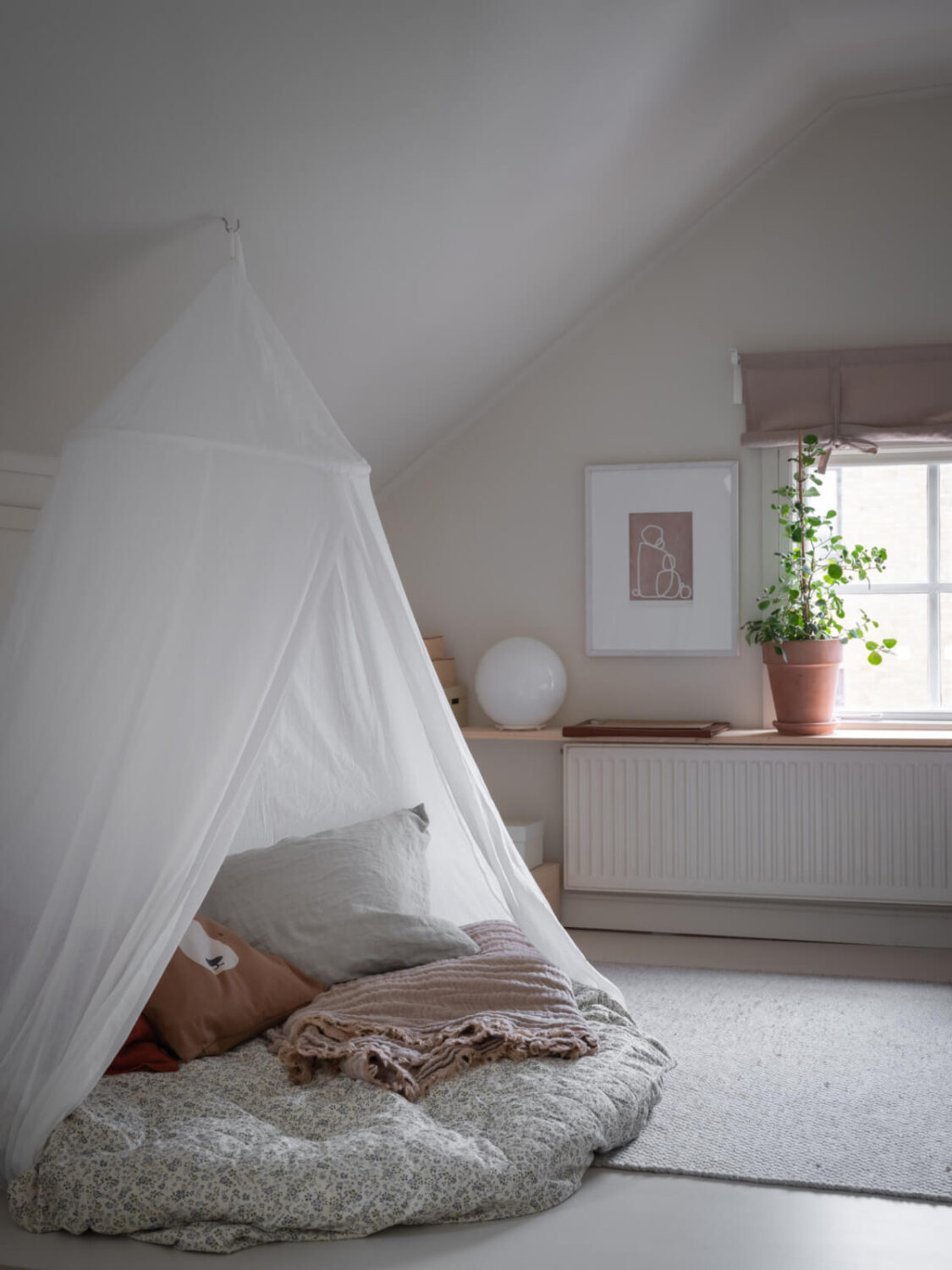 A Carefully Renovated Family Home in Sweden 34 play area with canopy