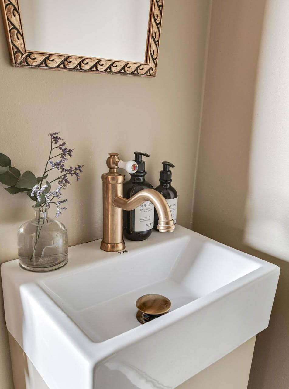 A Charming Home with Lake Views South of Stockholm 13 powder room sink