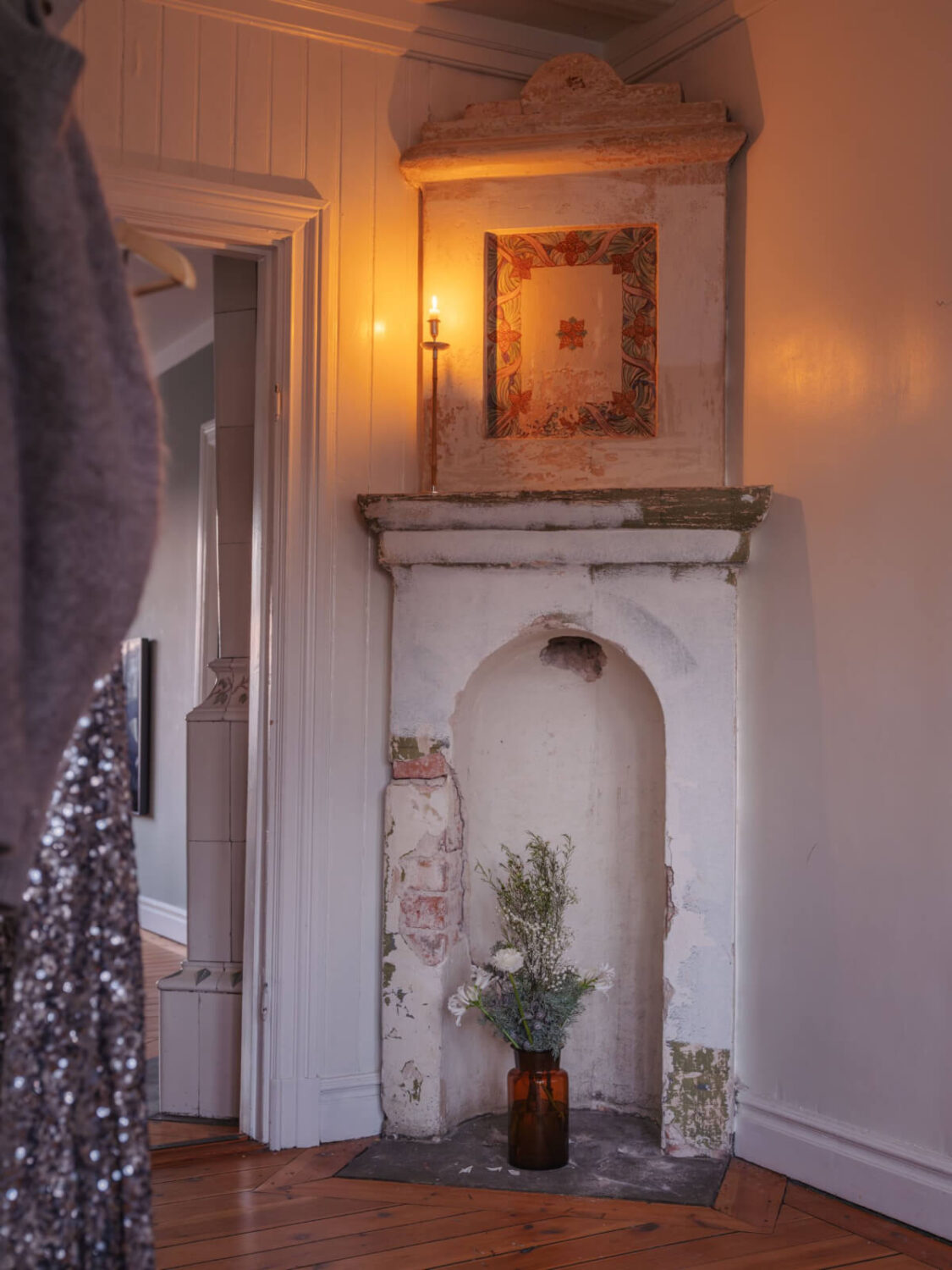 A Beautiful Turn-of-the-Century Family Home in Sweden 32 preserved fireplace